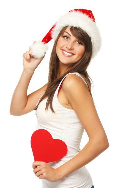 دختر زیبا در کلاه سانتا شکل قلب
