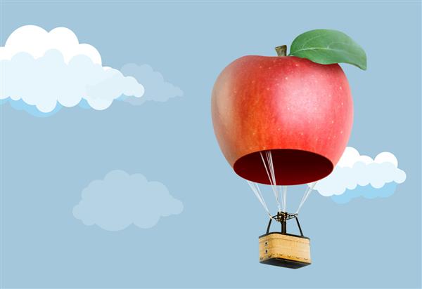 بالون هوای گرم سیب سه بعدی که در آسمان شناور است
