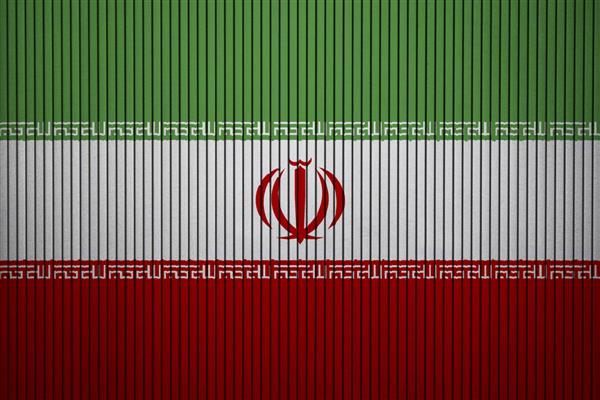 نقاشی پرچم ملی ایران بر روی دیوار بتنی