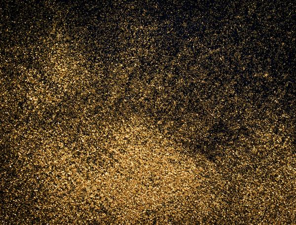 بافت انفجار طلا در زمینه مشکی جدا شده است