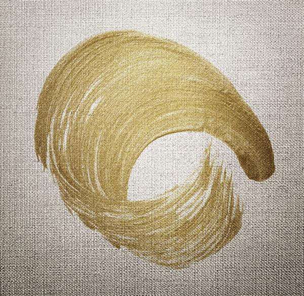 بافت قلم مو رنگ روغن طلایی روی پس‌زمینه بافت‌دار پارچه قهوه‌ای