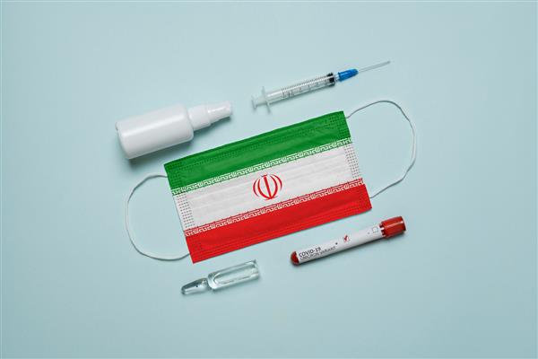 لوله خون برای تشخیص ویروس کووید 19 نوع Omicron با نتیجه مثبت ماسک دارویی با پرچم ایران و واکسن نوع جدید کووید 19 Omicron