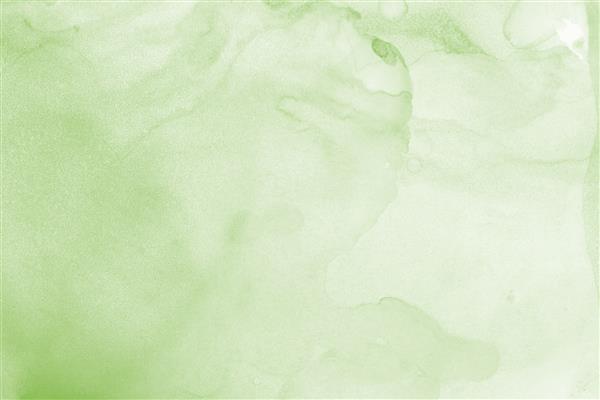 بافت شستشوی جوهر الکل سبز در زمینه کاغذ سفید جریان رنگ مایع اثر اثیری شفاف