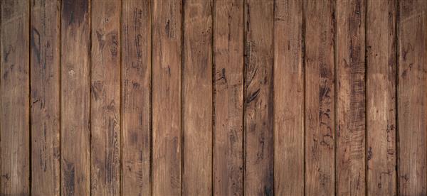 پس زمینه بافت چوب قهوه ای از درخت طبیعی پانل چوبی دارای یک الگوی تیره زیبا بافت کف چوبی است