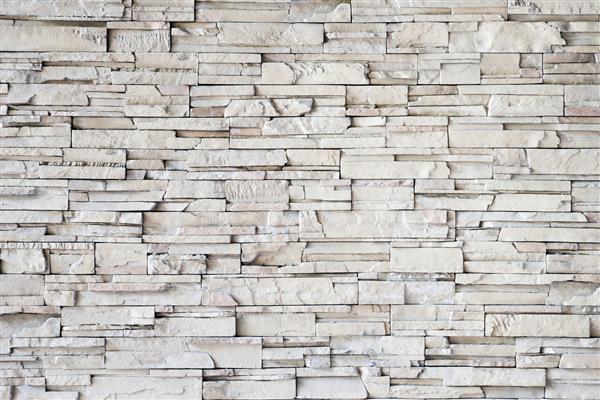 نمای نزدیک از یک دیوار آجری خاکستری پس زمینه بافت سنگی مدرن
