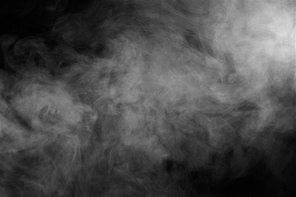 بافت دود انتزاعی روی سیاه مه در تاریکی