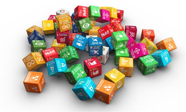 اهداف جهانی توسعه پایدار تصویر مکعب های رنگارنگ رندر سه بعدی بالای برگ سبز مسئولیت اجتماعی شرکت توسعه پایدار برای جهانی بهتر
