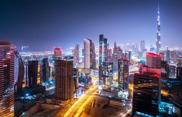 شهر زیبای شبانه منظره شهری دبی امارات متحده عربی معماری مدرن اینده نورپردازی شبانه مفهوم سفر لوکس
