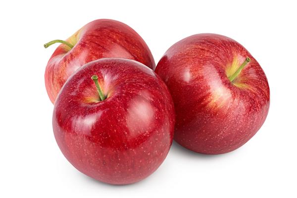 سیب قرمز جدا شده در پس زمینه سفید با مسیر برش و عمق میدان کامل