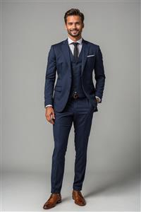 عکس باکیفیت مرد جوان با کت و شلوار سورمه‌ای رسمی مناسب برای بنرهای تبلیغاتی، پوستر مغازه خیاطی و پوشاک مردانه