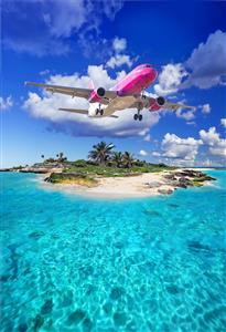 تصویر رویایی هواپیما بر فراز جزیره کیش و دریای نیلگون مناسب برای چاپ روی پرده و پوستر دیواری