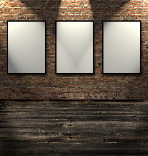 سه قاب خالی در یک اتاق در برابر یک دیوار آجری سفید