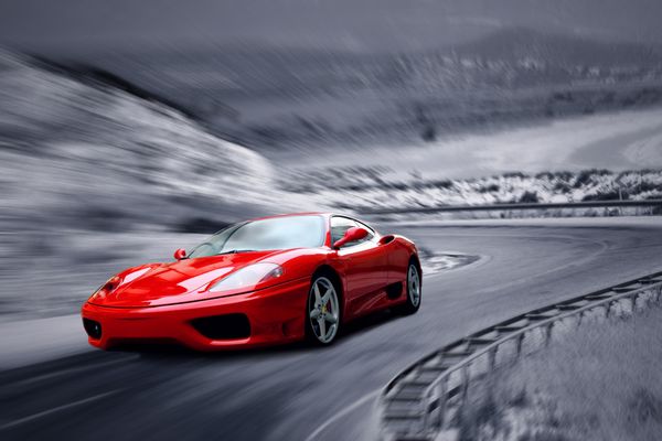 ماشین اسپرت قرمز سرعت زیبا در جاده