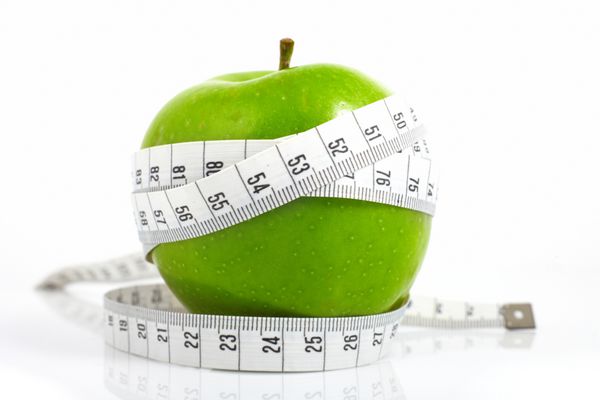 سیب های سبز متر را اندازه گرفتند سیب های ورزشی
