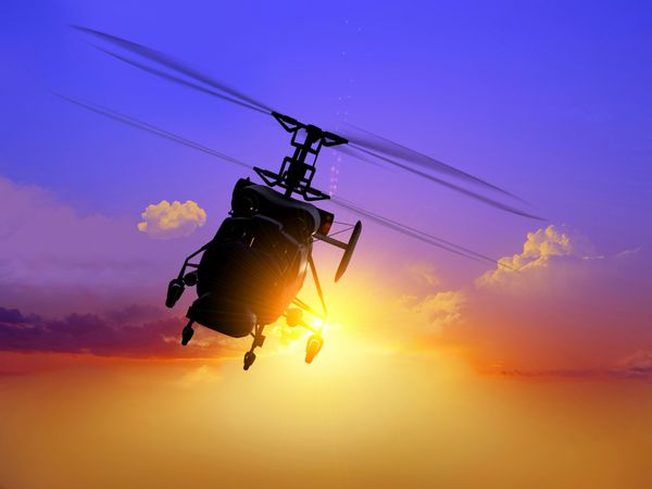 هلیکوپتر نظامی در آسمان پس زمینه