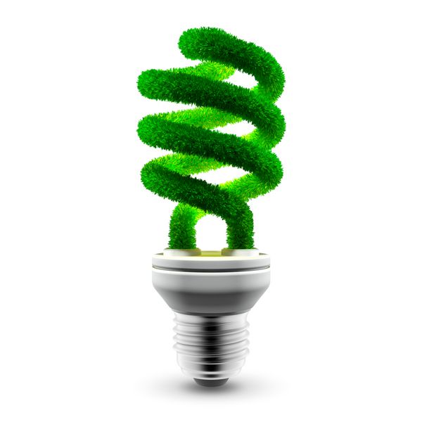 لامپ صرفه جویی در انرژی مفهومی - لوله مارپیچ شیشه ای با چمن سبز پوشانده شده است