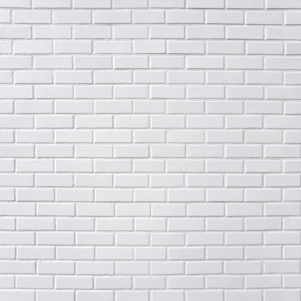 پس زمینه دیوار آجری سفید مربع