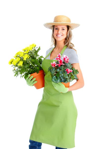 باغبانی زن کارگر با گل با زمینه سفید مجزا شده است