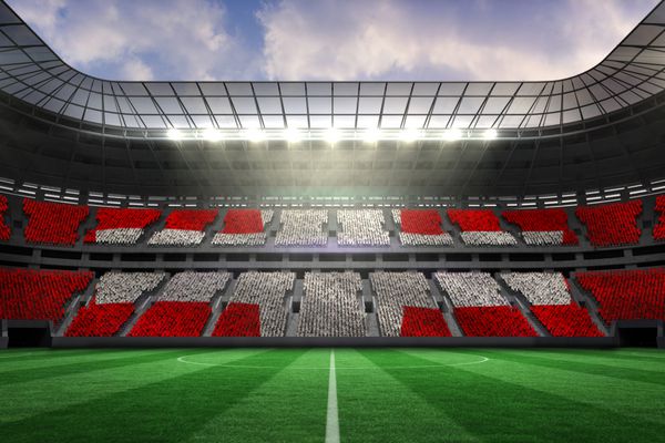 پرچم ملی سوئیس به صورت دیجیتالی در مقابل استادیوم بزرگ فوتبال تولید شده است