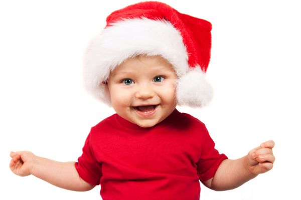 کودک کریسمس شایان ستایش در کلاه قرمزی جدا شده