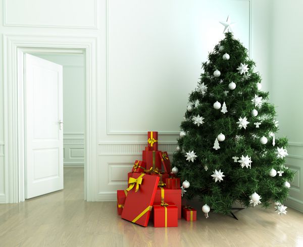 درخت کریسمس و هدایایی در اتاق نشیمن