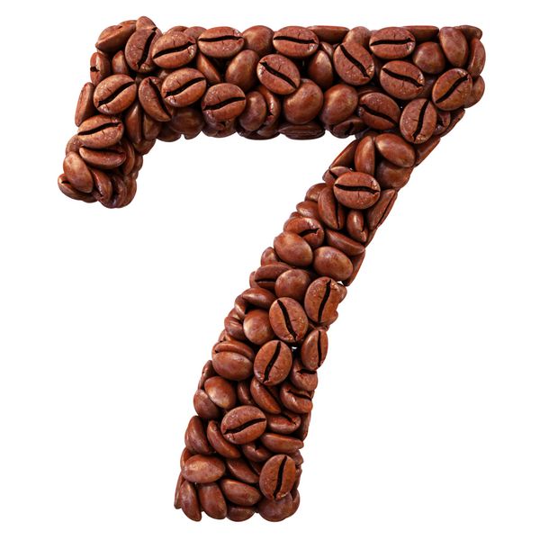 شماره از دانه های قهوه جدا شده روی سفید