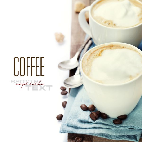 نمای نزدیک از فنجان قهوه سفید با دستمال آبی به همراه متن نمونه