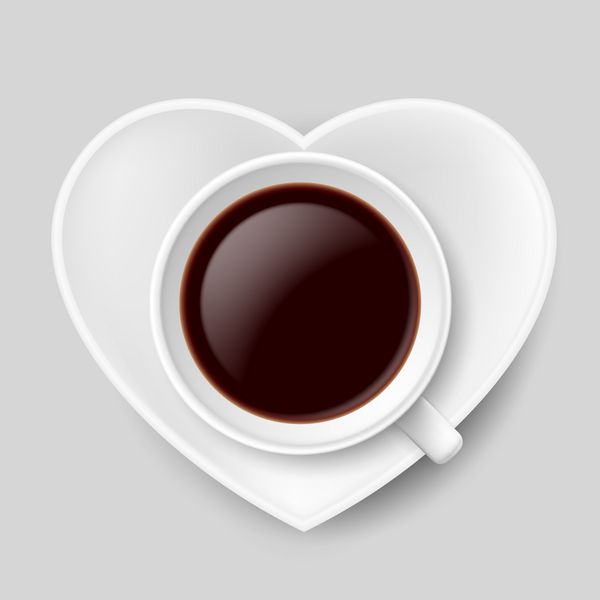 فنجان کامل قهوه روی نعلبکی سفید به شکل قلب به عنوان نماد عشق قهوه