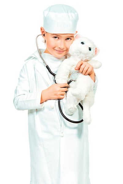 پسر بچه ای که نقش یک دکتر دامپزشک را بازی می کند مشاغل مختلف جدا شده روی سفید