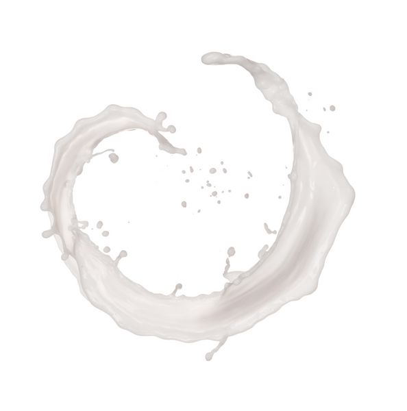 عکس جدا شده از پاشیدن شیر در پس زمینه سفید