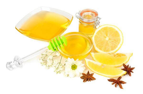 عسل شیرین با لیمو جدا شده روی سفید