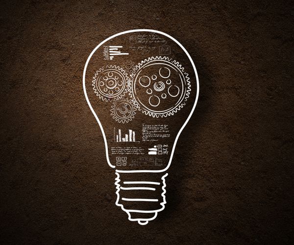 تصویر مفهومی لامپ و طرح استراتژی تجاری