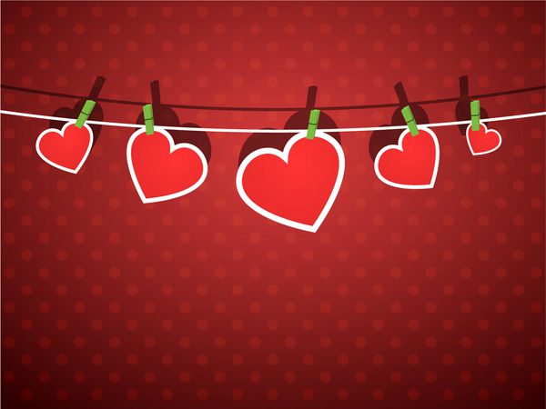 قلب های کاغذی آویزان از طناب روی کاغذ دیواری قرمز بخشی از ست روز ولنتاین هنر وکتور