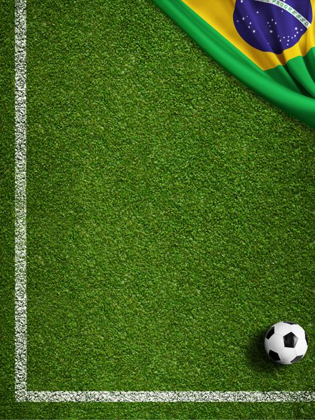 زمین فوتبال با توپ و پرچم برزیل