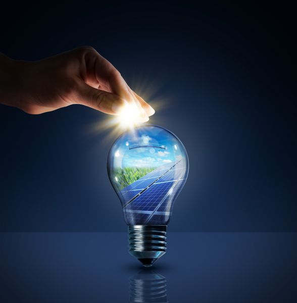 سرمایه گذاری در انرژی خورشیدی - مفهوم - خورشید در لامپ