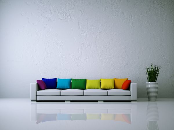 Weiأںes Sofa mit Kissen Regenbogenfarben