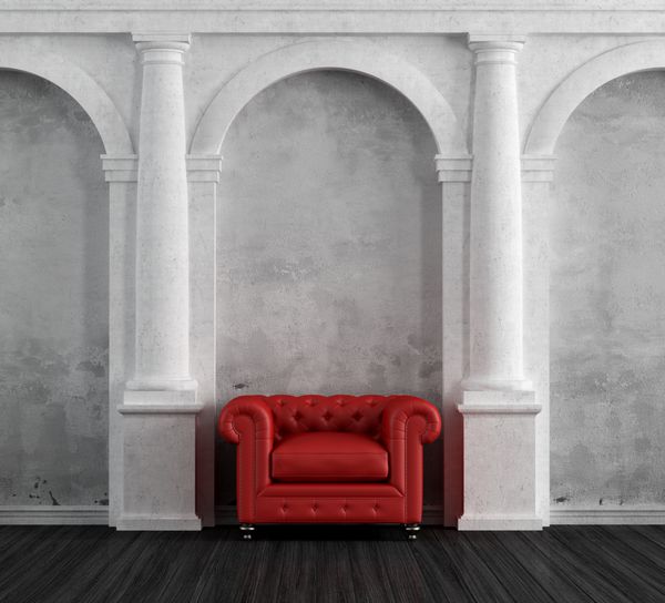 صندلی راحتی قرمز در یک خانه کلاسیک لوکس