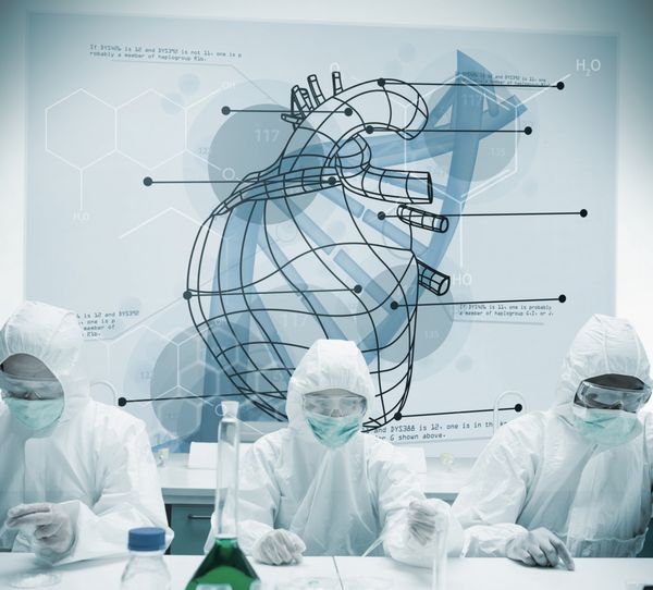 شیمیدانانی که با رابط آینده نگر کار می کنند که قلب و DNA را نشان می دهد
