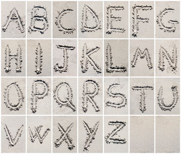نوشتن حروف الفبا در ساحل شنی