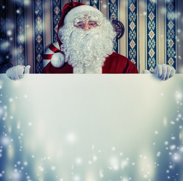 پرتره بابا نوئل که تخته سفید در دست دارد کریسمس