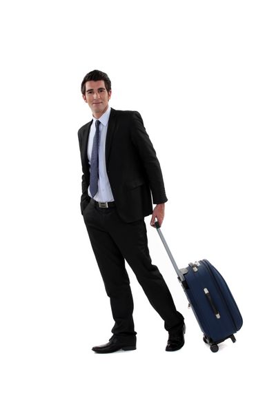 یک تاجر با چمدانش