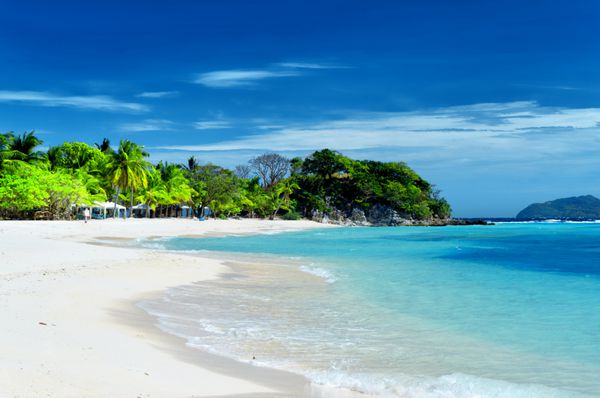 ساحل شن سفید جزیره malcapuya تاج فیلیپین