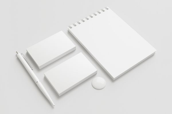 مجموعه شناسه شرکتی خالی لوازم التحریر جدا شده روی سفید شامل کارت ویزیت خودکار دکمه و دفترچه یادداشت است
