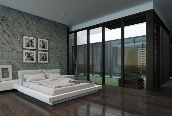 فضای داخلی اتاق خواب مدرن با دیوار سنگی