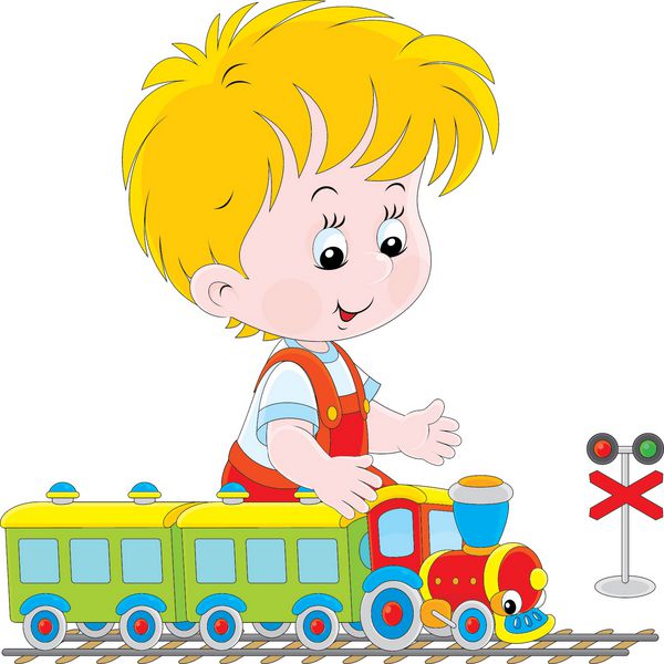 پسر بچه با قطار اسباب بازی کوچک