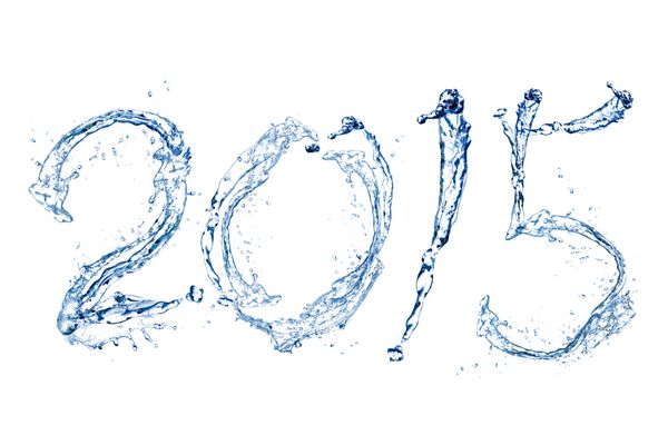 سال نو 2015 مبارک توسط پاشش خالص آب جدا شده در پس زمینه سفید