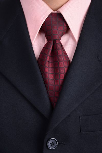 تاجر باهوش با کت و شلوار تجاری و کراوات
