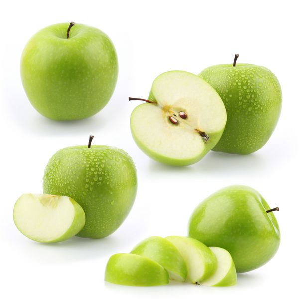 مجموعه سیب سبز جدا شده در پس زمینه سفید مجموعه