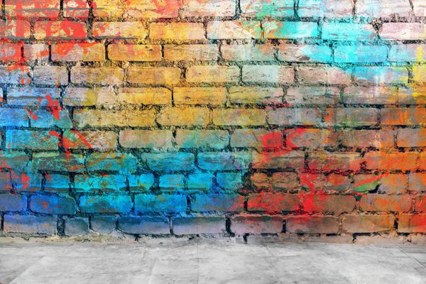 دیوار آجری گرافیتی پس زمینه رنگارنگ