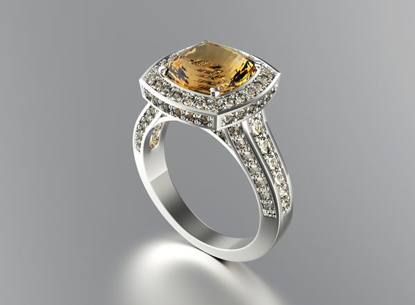 انگشتر طلایی با الماس پس زمینه جواهرات روز